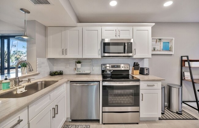 Building Photo - Rates Vary: $2,495-$4,995