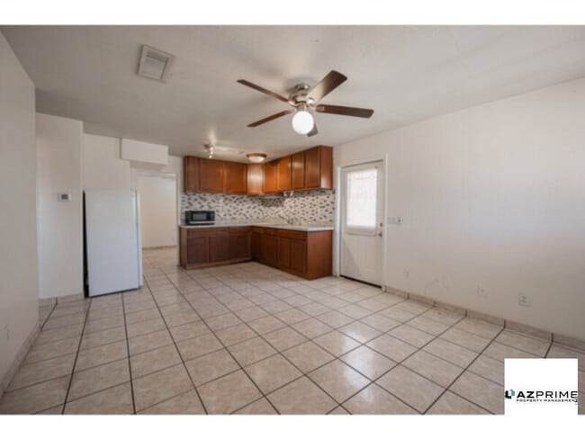 Building Photo - Discover this Charming 2/1 Phoenix Triplex...