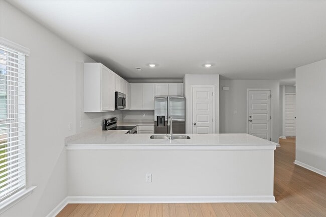 Building Photo - New 3BR Home in Whispering Woods – East At...