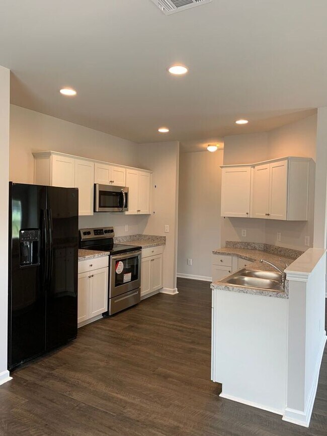 Building Photo - BRAND NEW Three Bedroom | Two Bath Home in...
