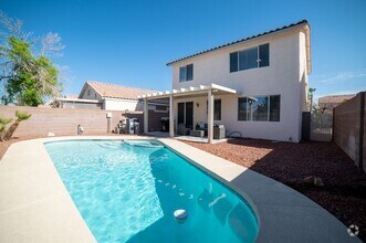 Building Photo - Beautiful home with POOL and spa located n...