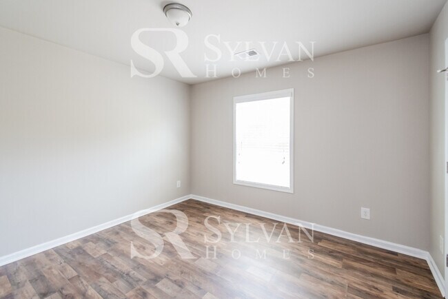 Building Photo - Embrace the charm of this 4 BR, 2.5 BA home