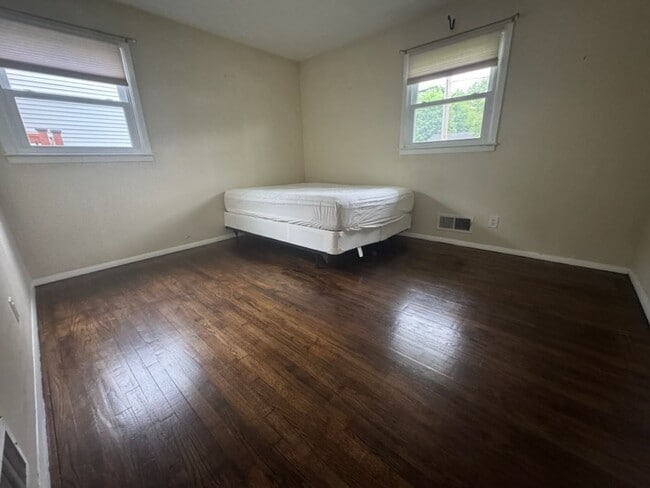 Building Photo - Sunny, Modern Mid-Century Cape 4 BR Spacio...