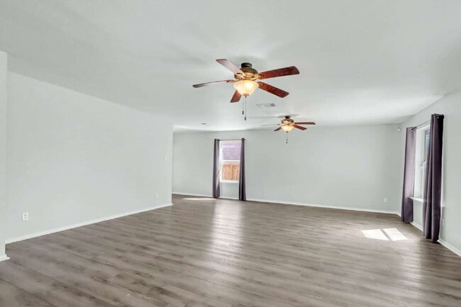 Building Photo - "Spacious 4-Bed, 3-Bath Retreat with Solar Panels!"