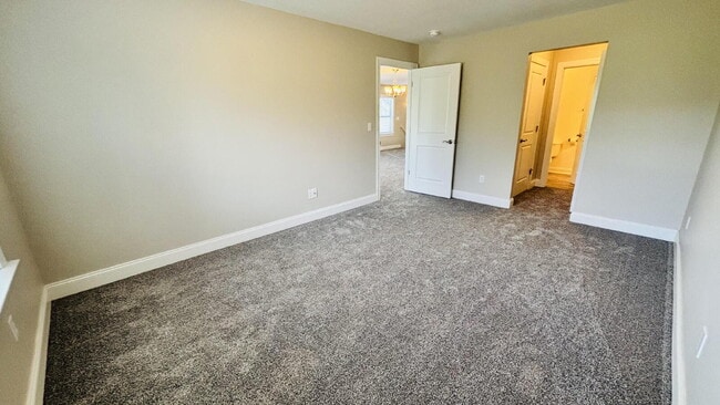 Building Photo - "Spacious 3-Bed, 2-Bath Condo Retreat in Fletcher – 1413 Sq Ft of Comfort. With $250 move in spec...