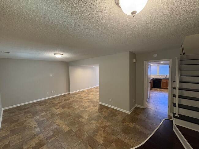 Building Photo - Four Bedroom Townhome Available Now
