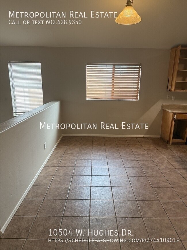 Building Photo - 10504 W Hughes Dr