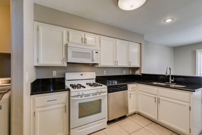 Building Photo - GORGEOUS HOME WITH TONS OF UPGRADES*GATED COMMUNITY WITH A COMMUNITY POOL*