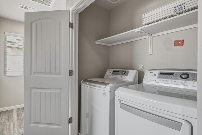 Building Photo - Gated Community Home with Solar Panels & All Appliances Included