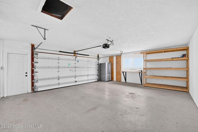 Building Photo - Welcome to this beautifully remodeled 4-bedroom, 3-bath home in the heart of Indialantic Beach!