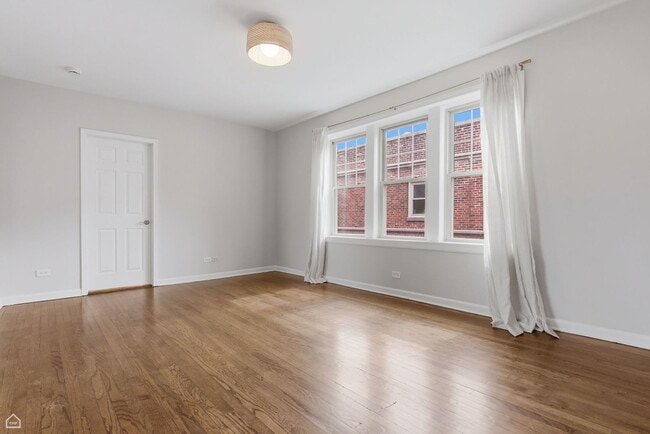 Building Photo - 7318 N Honore St