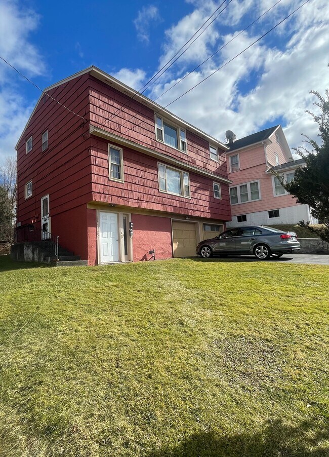 Building Photo - Genesee Park Dr 123/125