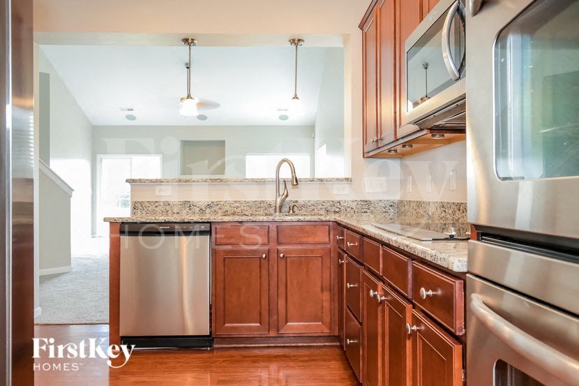 Building Photo - 6806 Championship Dr