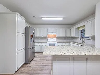 Building Photo - 411 Bluebonnet St