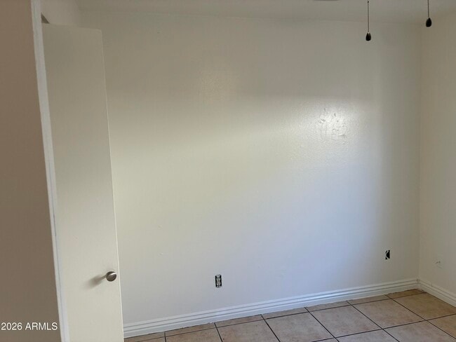 Building Photo - 8819 W Roma Ave