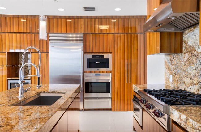 Building Photo - 9701 Collins Ave