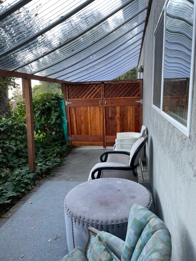 Lots of greenery! Gates closed. - 27 Graceland Dr