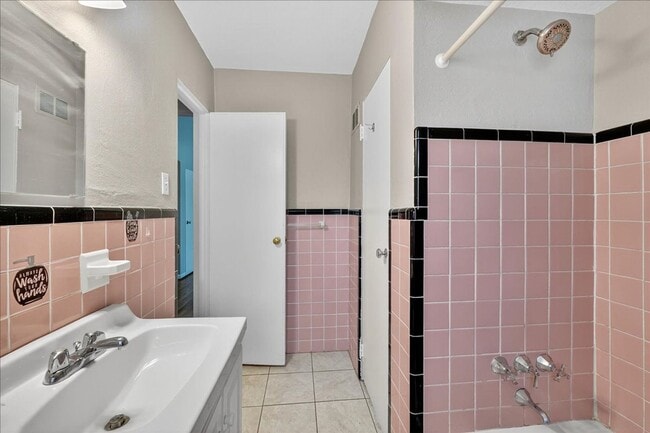 Building Photo - Pink Bathroom Club