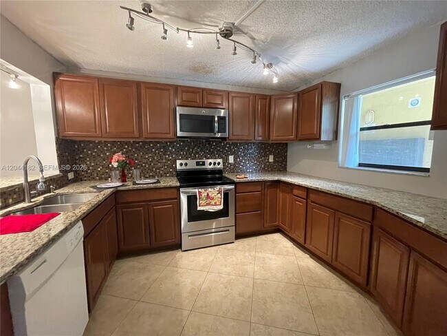 Building Photo - 9044 NW 28th Dr