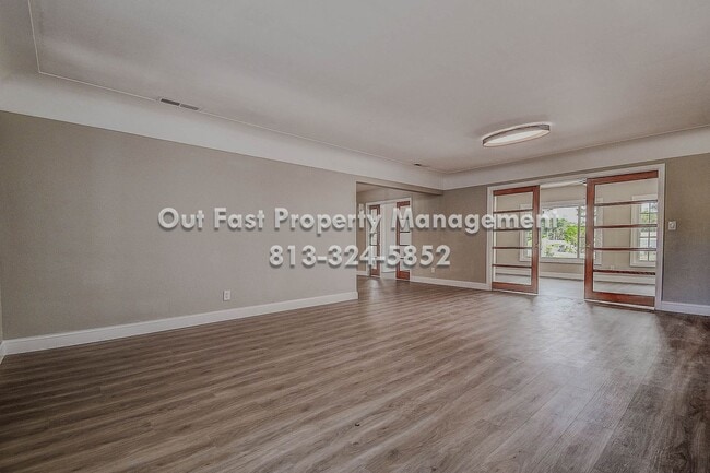 Building Photo - Home & Bonus Space Near Gulf Beaches — Ready for Move-In