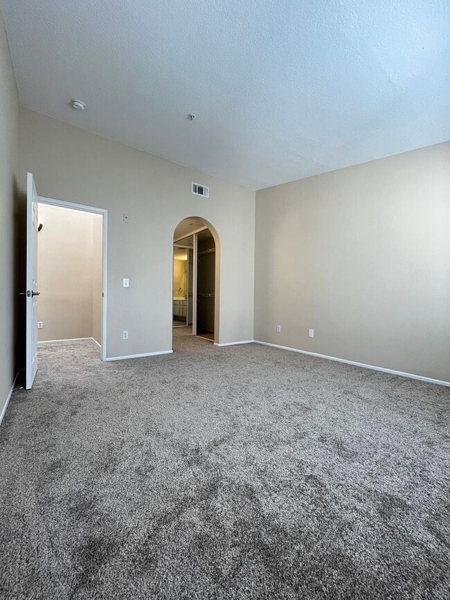 Building Photo - PICTURE PERFECT!  3 BR/3 BA END UNIT CONDO with DIRECT ACCESS 2 CAR GARAGE