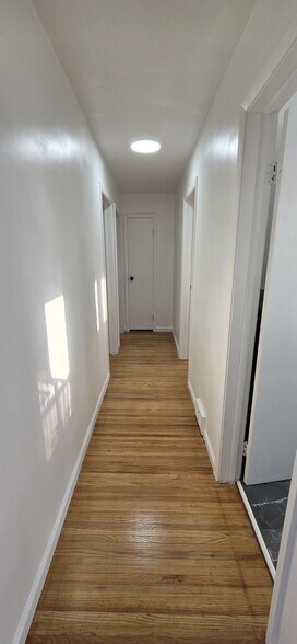 Hall to the bathroom and 3 bedrooms - 20 Audabon Ter