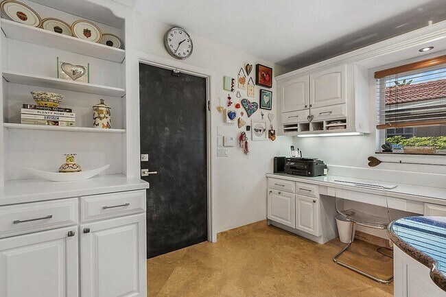 Kitchen features "chalkboard door" includes desk area and more storage - 2535 NW 41st St