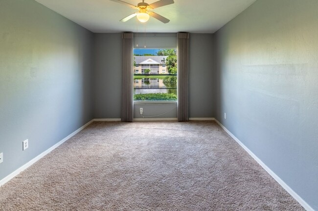 Building Photo - Well-Maintained 2BR/2BA Condo with Lake Vi...