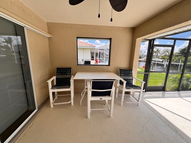 Building Photo - Waterfront Paradise in Punta Gorda Isles –...