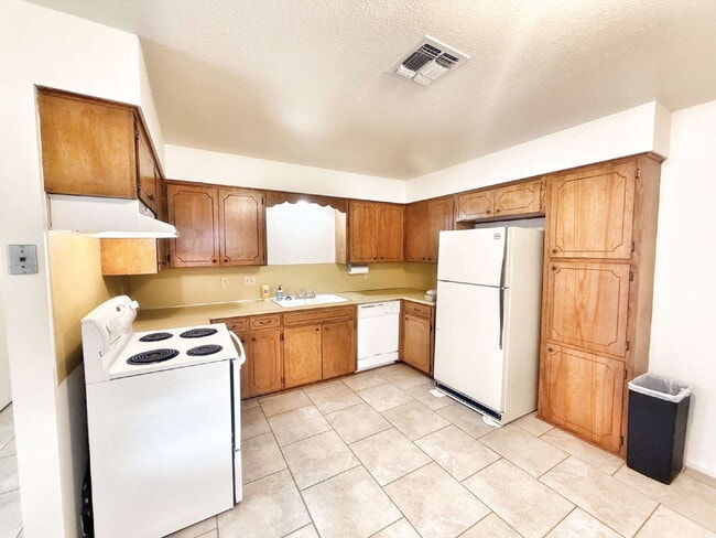 Building Photo - Prime Location! Fresh Paint – Charming 2BR...