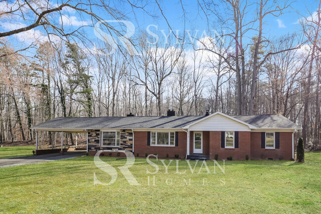 Primary Photo - Nice brick home with beautiful curb appeal