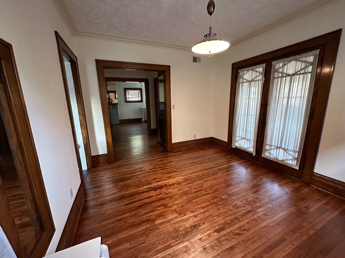 Dining room with French doors that open onto front porch - 705 2nd St NW