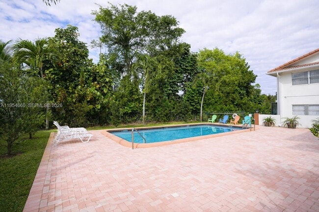 Building Photo - 3200 Coral Springs Dr