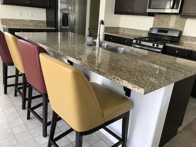 Building Photo - Private large 4 bed NextGen, with double living rooms, kitchens and laundries.