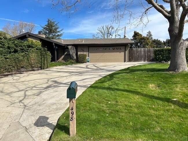 Building Photo - NEW PRICE – Move-In Ready Home with Expansive Yard & RV Parking