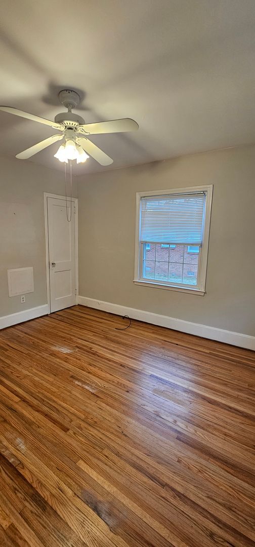 Building Photo - Quiet Living and Charm Meets Downtown Conway