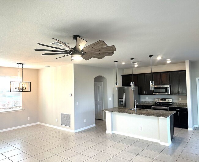 Building Photo - Available Now!! NW CAPE CORAL 3 BEDROOM 2 BATHROOM 2 CAR GARGAGE