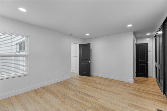 Building Photo - COMPLETELY REMODELED, BRIGHT & AIRY, TRI-LEVEL HOME W/ TOP-FLOOR GREAT ROOM LIVING SPACE, 2-CAR G...