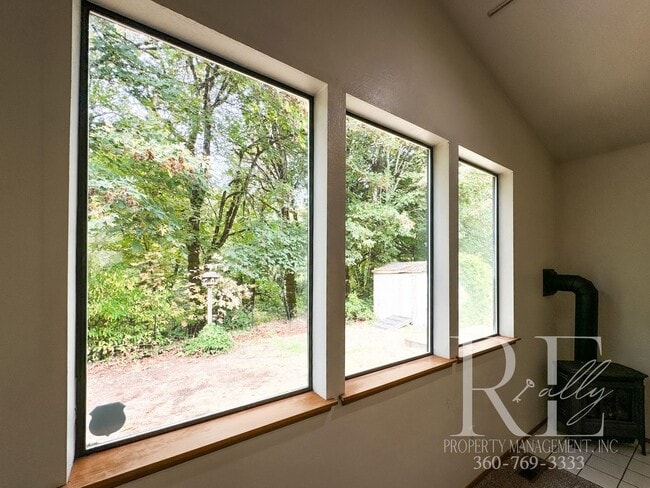 Building Photo - Your Charming Rustic Retreat- 3 Bedroom With Wrap-A-Round Yard