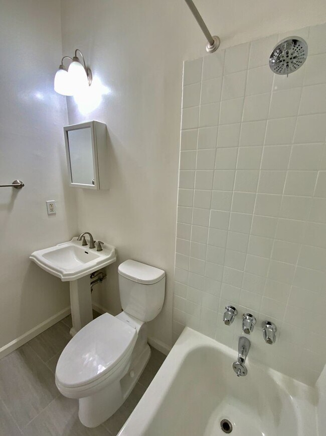 Building Photo - RENOVATED 2BR. Dishwasher! Laundry On-Site...