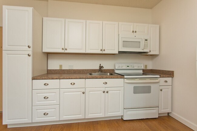 Building Photo - Plantation Town Apartments #112
