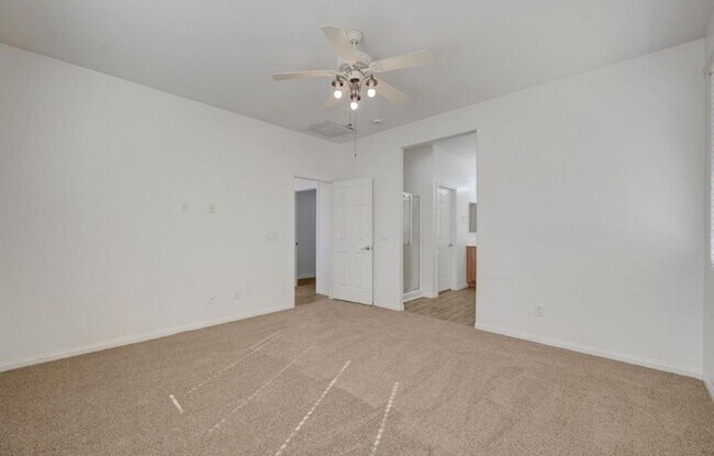 Building Photo - BEAUTIFUL 4 BEDROOM HOME IN GUARD GATED COMMUNITY!