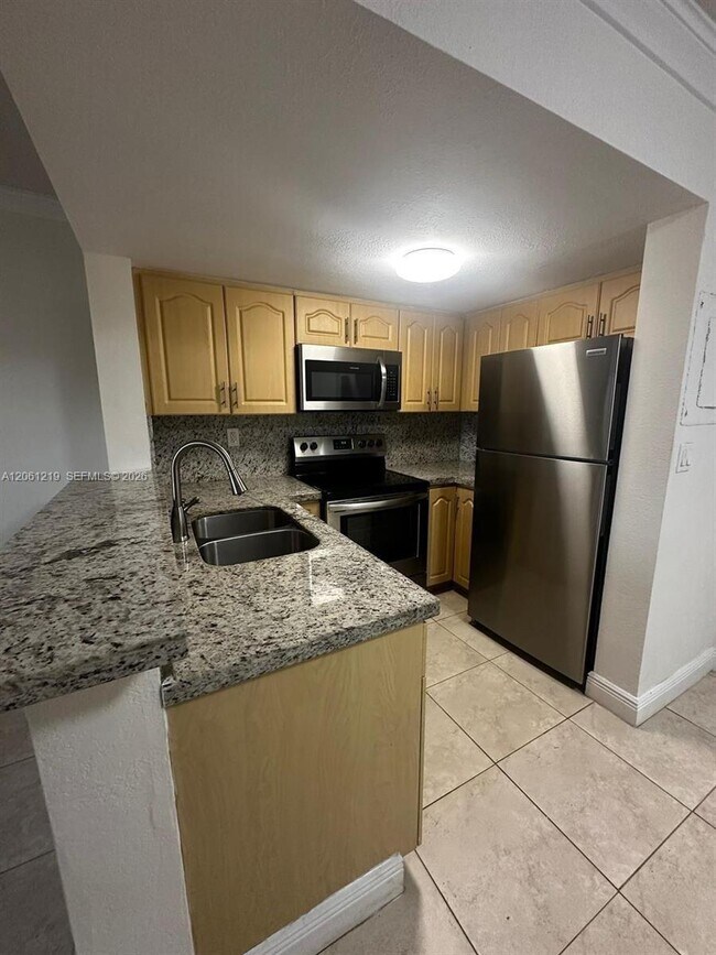 Building Photo - 8660 NW 6th Ln