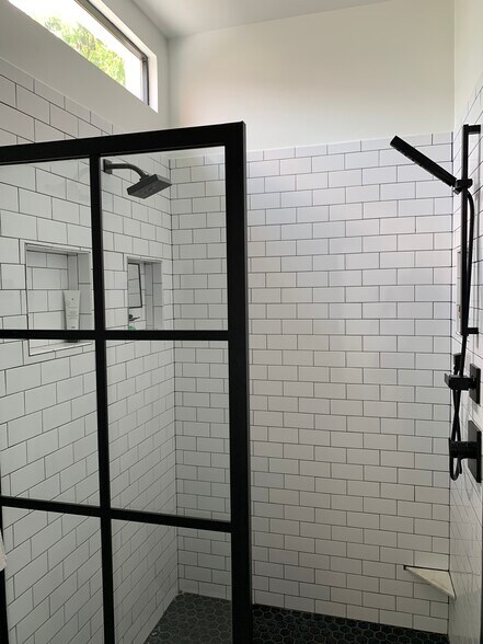 Primary bathroom with huge walk in shower - 1316 Pleasant St