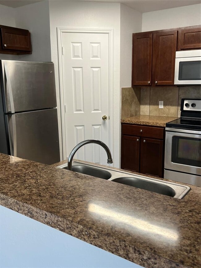 Building Photo - 1038 Trail Driver Cove