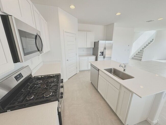 Building Photo - MOVE IN SPECIALS!! New 5-Bedroom Home in P...