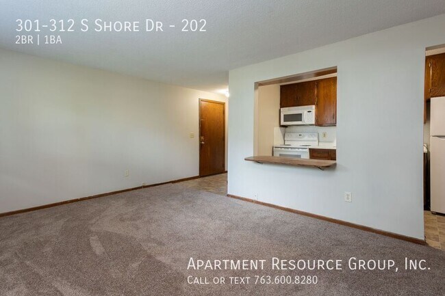 Building Photo - 301-312 S Shore Dr-202