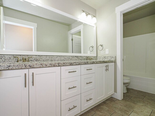 Building Photo - 4-bedroom, 2.5 bathroom Home