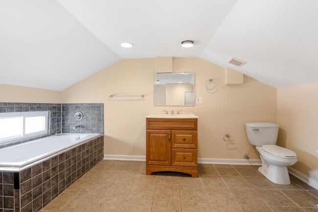 Building Photo - Spacious 2BR/2.5BA Townhome with Finished Basement & Extra Storage