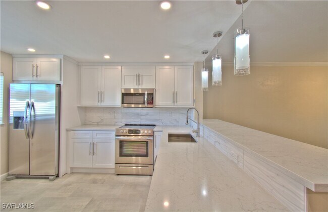 Building Photo - 2360 Naples Trace Cir
